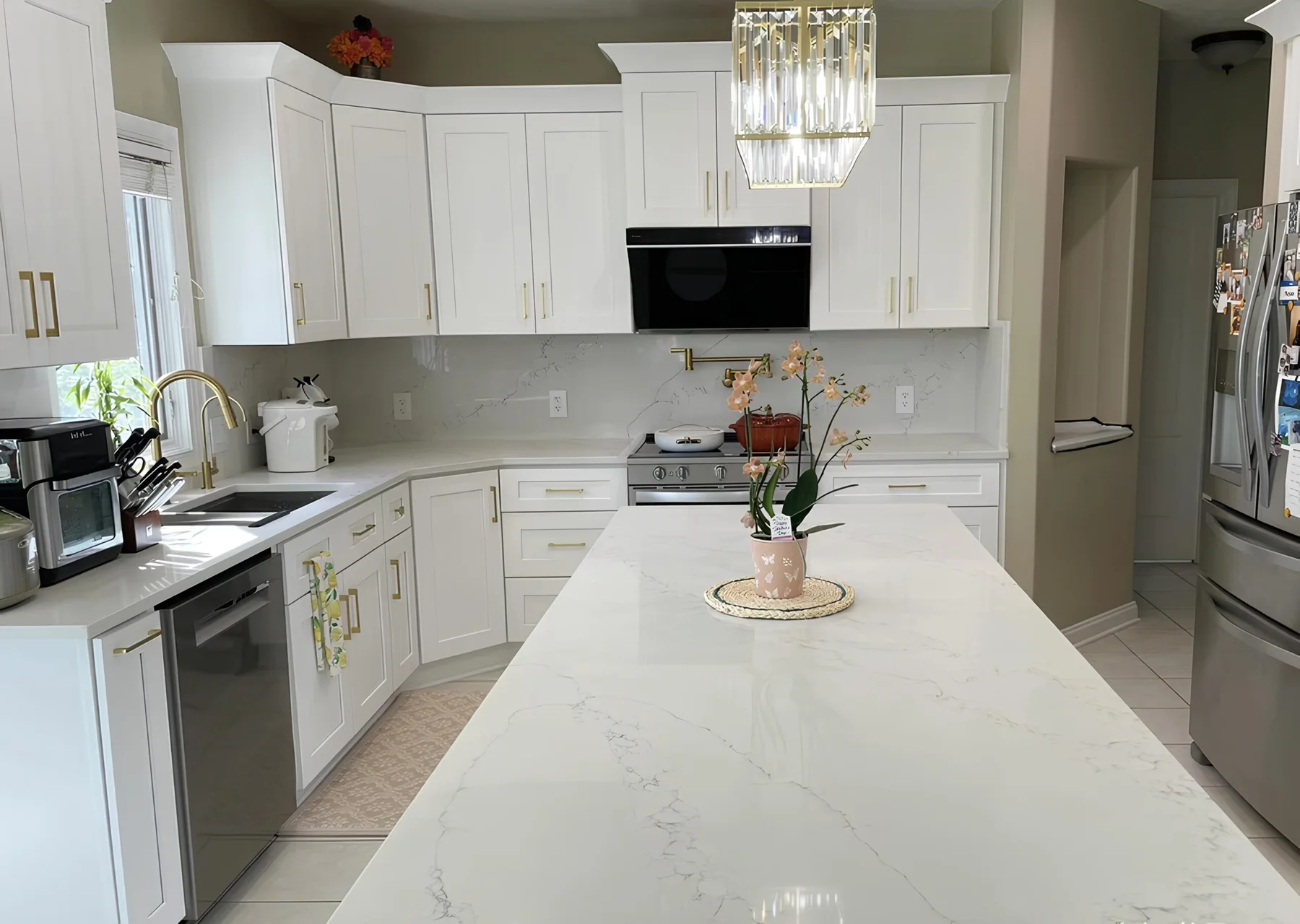 Bright kitchen with white Shaker cabinetry
